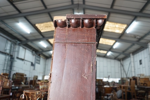 A 19th century Continental pine three door buffet with associated mahogany top, length 143cm, depth 67cm, height 196cm